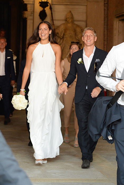 Bastian Schweinsteiger and Ana Ivanonic leave the wedding ceremony